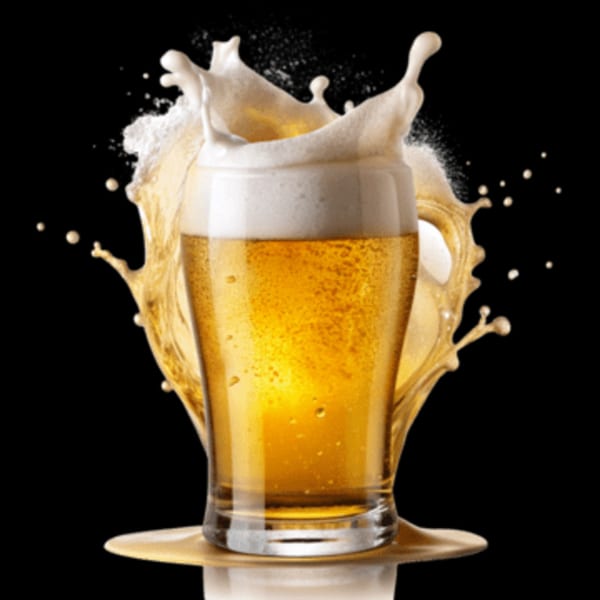 A glass of golden beer with a large splash of foam and liquid against a black background.