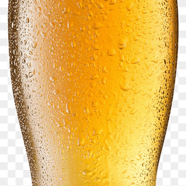 Close-up of a cold glass of golden beer with condensation droplets on its surface.